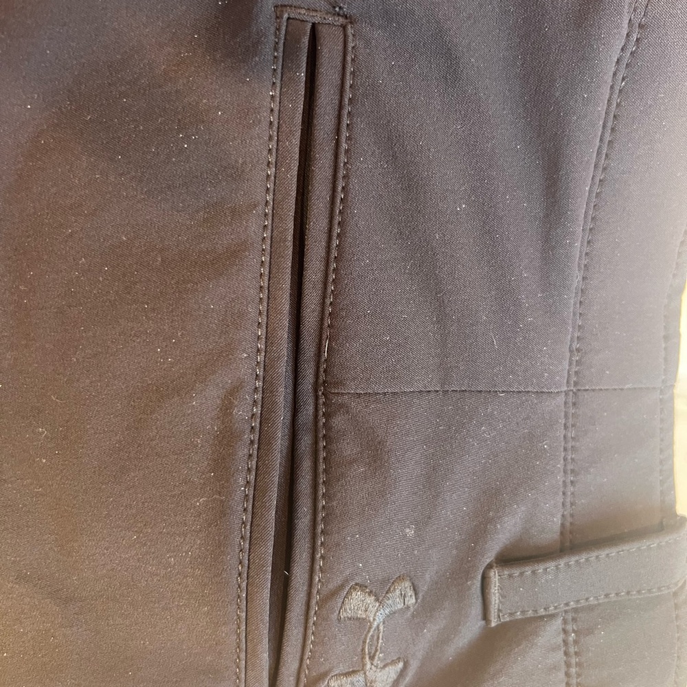 Under Armour Black Pants with Red Waistband.  Worn but in fantastic condition!